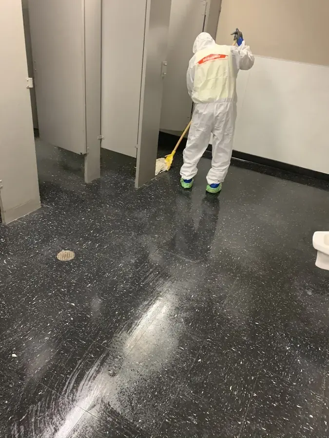 A crew cleaning a sewage backup in Tustin, CA
